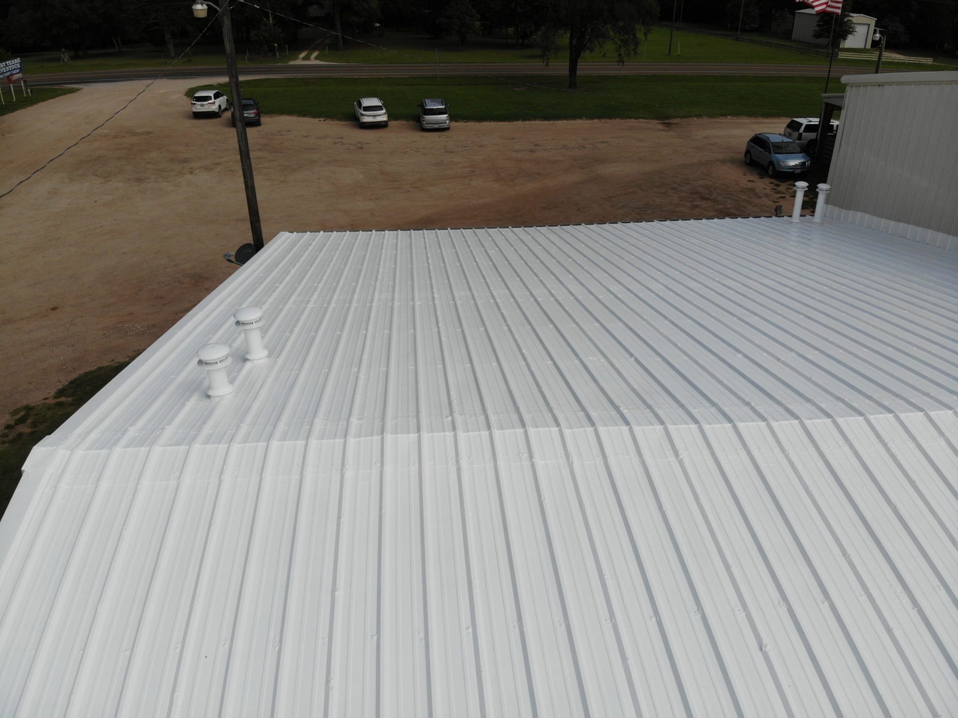 white coating metal restoration Alliance Roofing & Construction